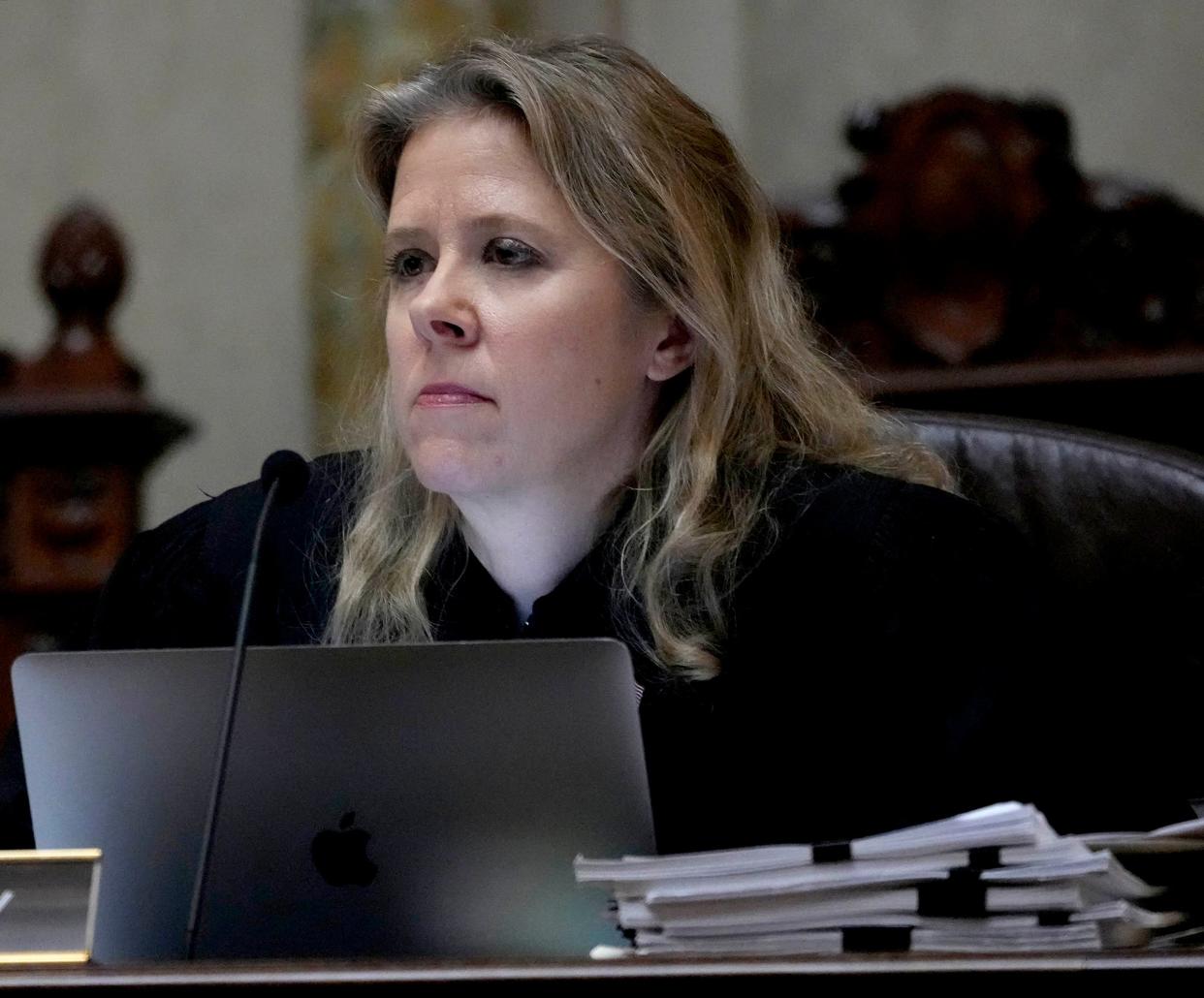 Wisconsin's Supreme Court justice Rebecca Bradley listens to comments as the State Supreme Court hears arguments in a case challenging Wisconsin's electoral maps at the Wisconsin State Capitol in Madison on Tuesday, Nov. 21, 2023.