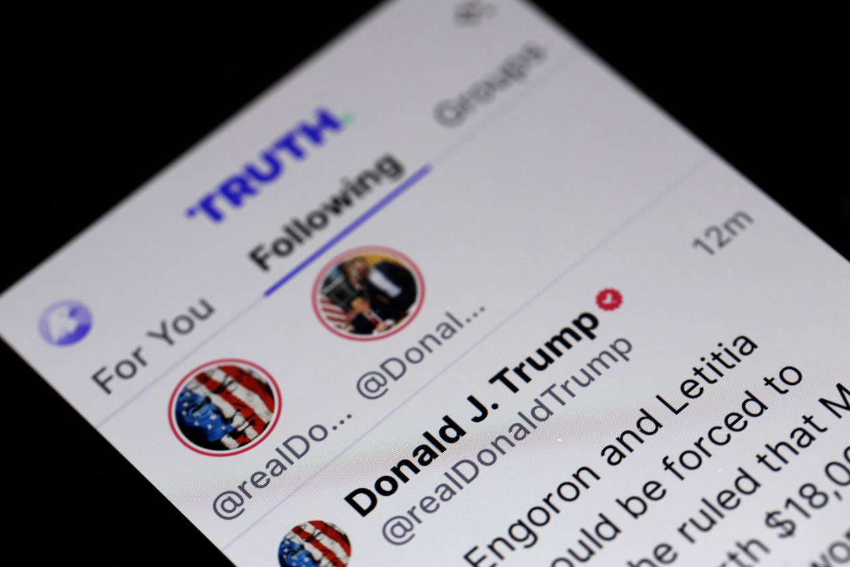 CHICAGO, ILLINOIS - MARCH 25: In this photo illustration, Republican presidential candidate former President Donald Trump's social media platform Truth Social is shown on a tablet on March 25, 2024 in Chicago, Illinois. The company is expected to go public tomorrow on the NASDAQ market, trading under the ticker symbol DJT. Trump reportedly owns about 58 percent of the company, a stake that is could be valued at roughly $3 billion. (Photo Illustration by Scott Olson/Getty Images)