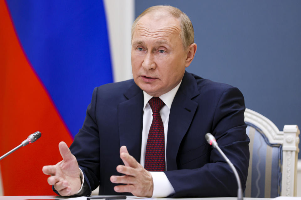 Russian President Vladimir Putin attends a video call of the VTB Capital "Russia Calling!" Investment Forum in Moscow, Russia, Tuesday, Nov. 30, 2021. (Mikhail Metzel, Sputnik, Kremlin Pool Photo via AP)