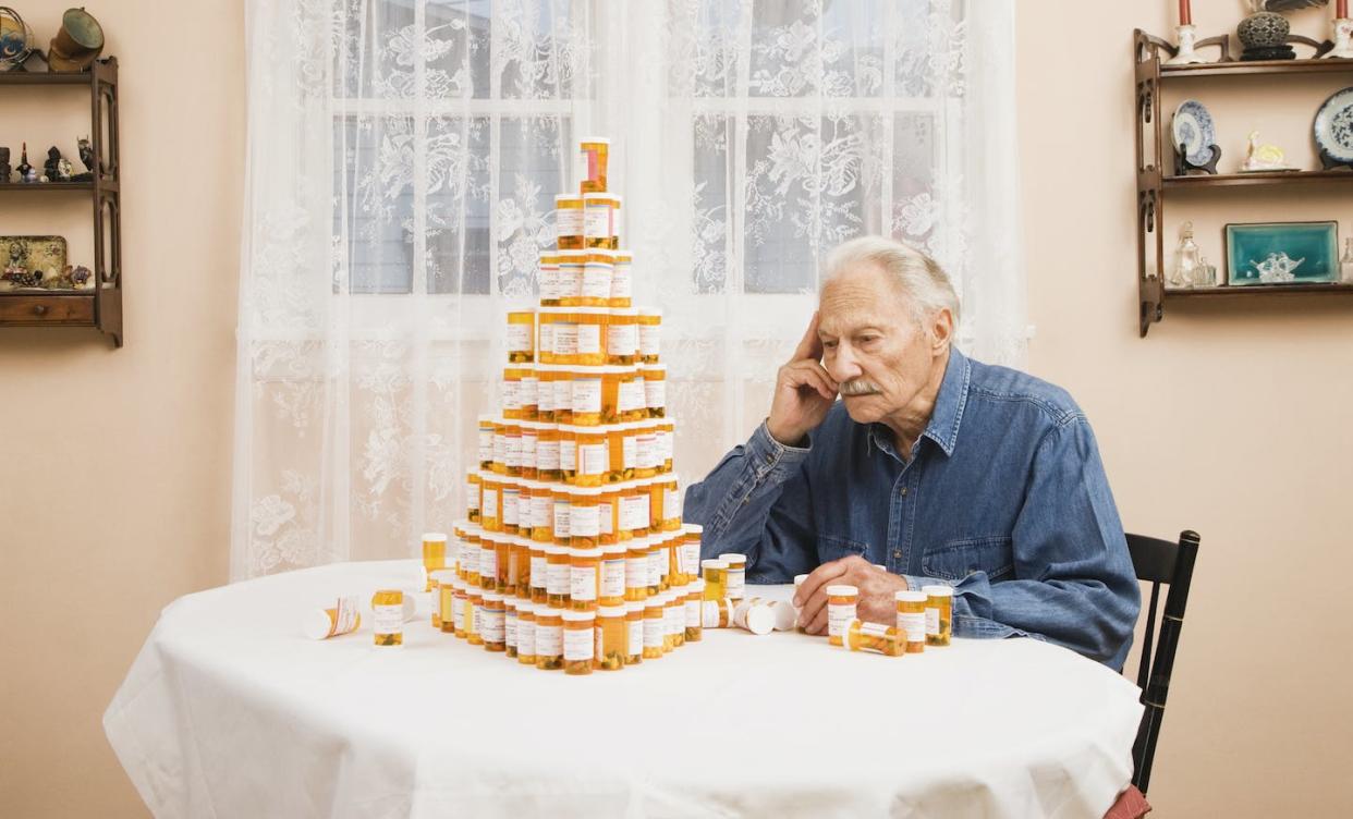 Having multiple prescriptions is difficult enough to keep track of, let alone ones with complicated names. <a href="https://www.gettyimages.com/detail/photo/senior-man-staring-at-stack-of-prescription-bottles-royalty-free-image/523006070" rel="nofollow noopener" target="_blank" data-ylk="slk:Hill Street Studios/Stone via Getty Images;elm:context_link;itc:0;sec:content-canvas" class="link ">Hill Street Studios/Stone via Getty Images</a>