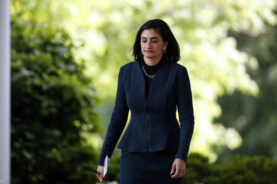 FILE - In this April 27, 2020, file photo Administrator of the Centers for Medicare and Medicaid Services Seema Verma walks to the Rose Garden to attend a briefing with President Donald Trump about the coronavirus in the Rose Garden of the White House in Washington. Federal health authorities have received reports of nearly 26,000 nursing home residents dying from COVID-19, according to materials prepared for the nation's governors. Verma says states should use “extreme caution” before reopening nursing homes to visitors. (AP Photo/Alex Brandon, File)