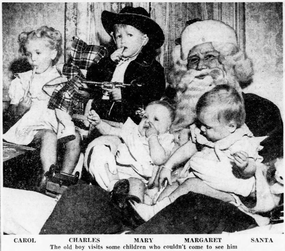 Santa with the Eidson children: From left, Carol, Charles, Mary, Margaret.