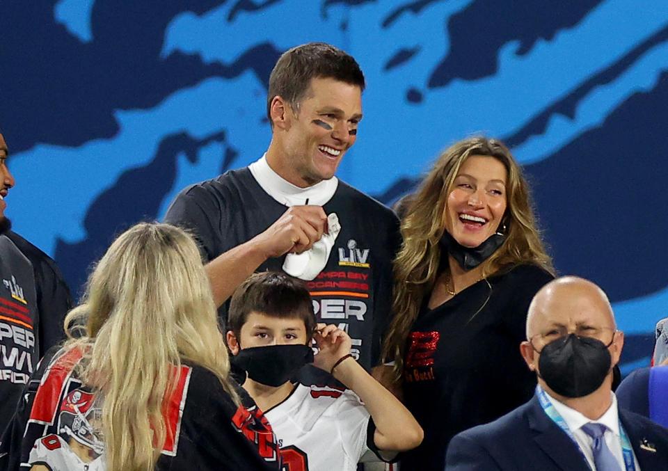 TAMPA, FLORIDA - FEBRUARY 07: Tom Brady #12 of the Tampa Bay Buccaneers celebrates with Gisele Bundchen after winning Super Bowl LV at Raymond James Stadium on February 07, 2021 in Tampa, Florida. (Photo by Kevin C. Cox/Getty Images)