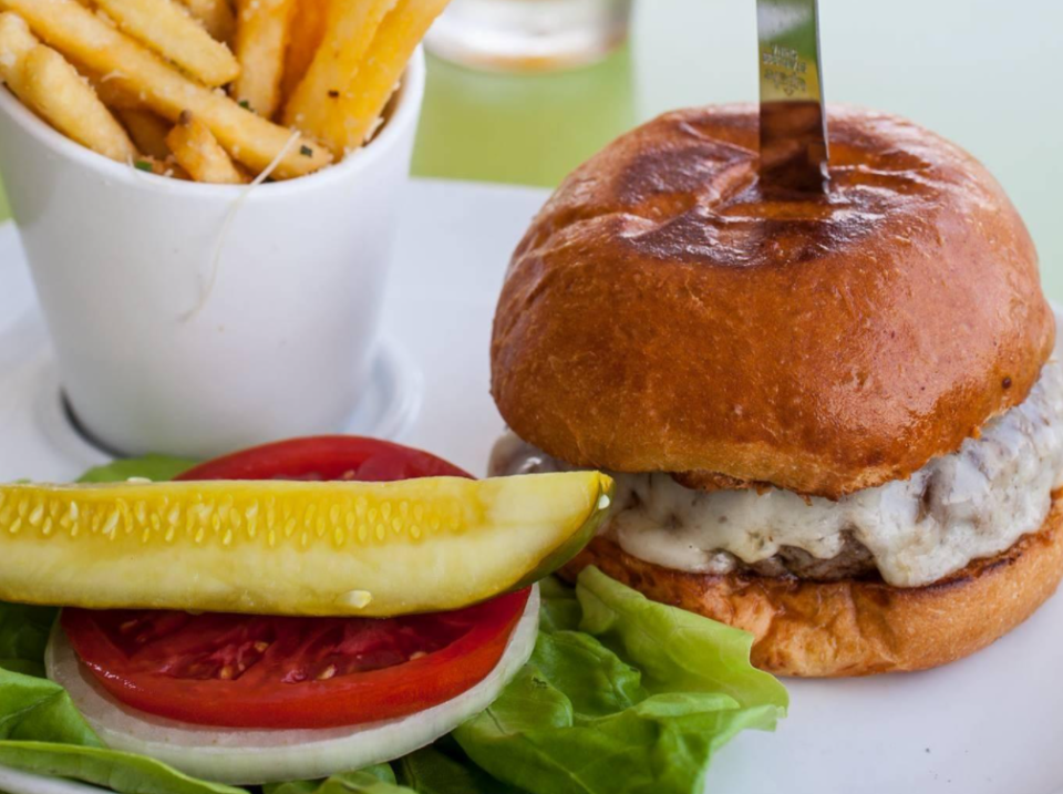 Both Shore locations, on St. Armands Circle and on Longboat Key overlooking Sarasota Bay, serve the Shore Burger.