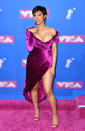 <p>Leave it to Cardi B to steal the show with her first official appearance since becoming a mom, thanks to her new pixie cut and velvet dress. (Photo: ANGELA WEISS/AFP/Getty Images) </p>