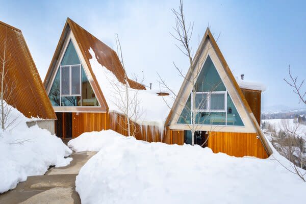 The two structures that comprise the home are connected by a breezeway and a Nordic sauna.