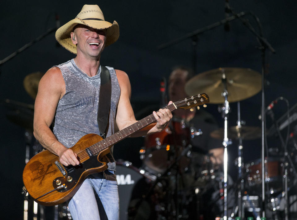 FILE - In this April 3, 2016, file photo, Kenny Chesney performs at the 4th Annual ACM Party for a Cause Festival in Las Vegas. Chesney’s No Shoes Reefs organization is helping to have an artificial reef installed off of Florida’s Atlantic Coast. The organization and other marine groups donated and installed 13 reef balls on the ocean floor off of Delray Beach in Palm Beach County. (Photo by Eric Jamison/Invision/AP, File)