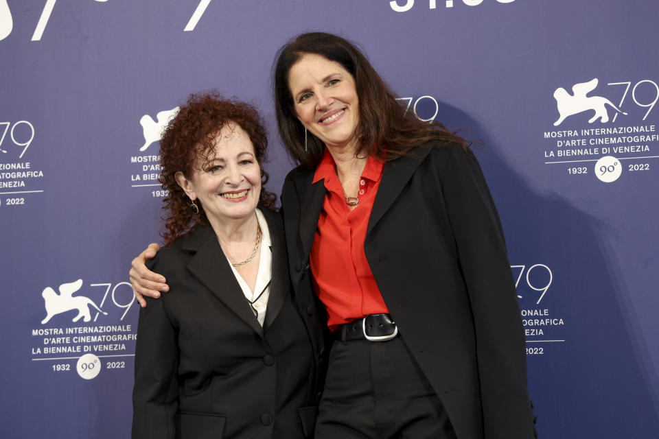 Nan Goldin, left, and director Laura Poitras pose for photographers at the photo call of the film 'All The Beauty and the Bloodshed' during the 79th edition of the Venice Film Festival in Venice, Italy, Saturday, Sept. 3, 2022. (Photo by Vianney Le Caer/Invision/AP)