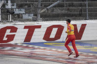 Joey Logano runs up the race track after winning a NASCAR Cup Series auto racing race at Darlington Raceway, Sunday, May 8, 2022, in Darlington, S.C. (AP Photo/Matt Kelley)