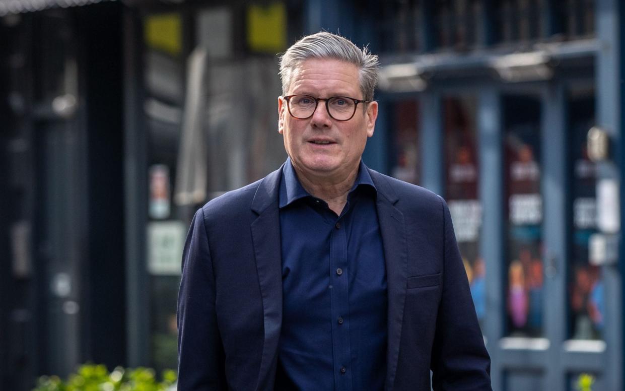 Sir Keir Starmer, the Labour Party leader, is pictured in central London this morning