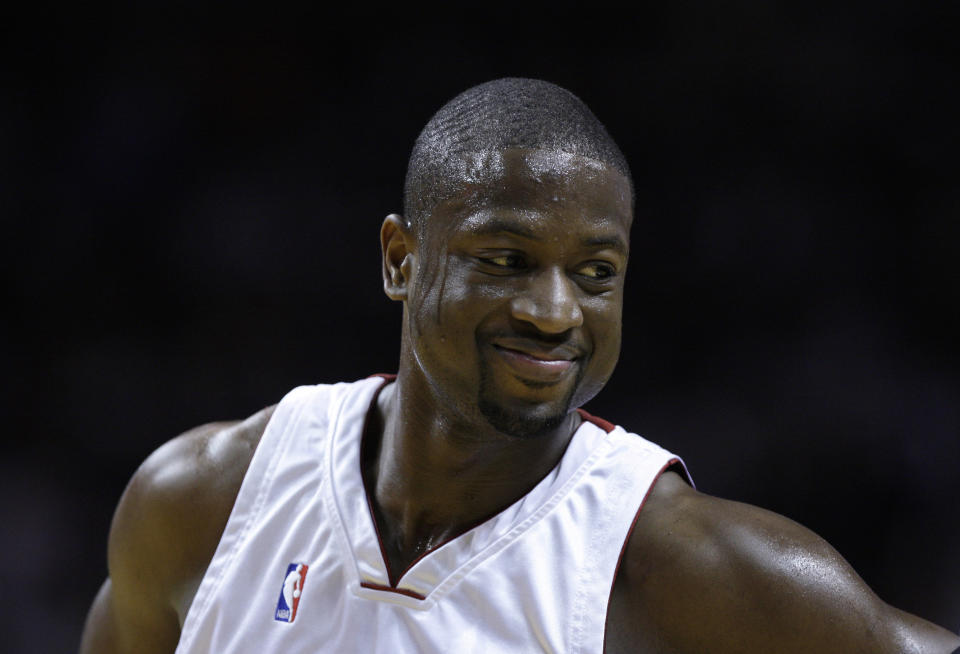 FILE - Miami Heat guard Dwyane Wade smiles during an NBA basketball game against the Los Angeles Lakers in Miami, March 4, 2010. Wade was announced Friday, Feb. 17, 2023, as being among the finalists for enshrinement later this year by the Basketball Hall of Fame. The class will be revealed on April 1. (AP Photo/Lynne Sladky, File)