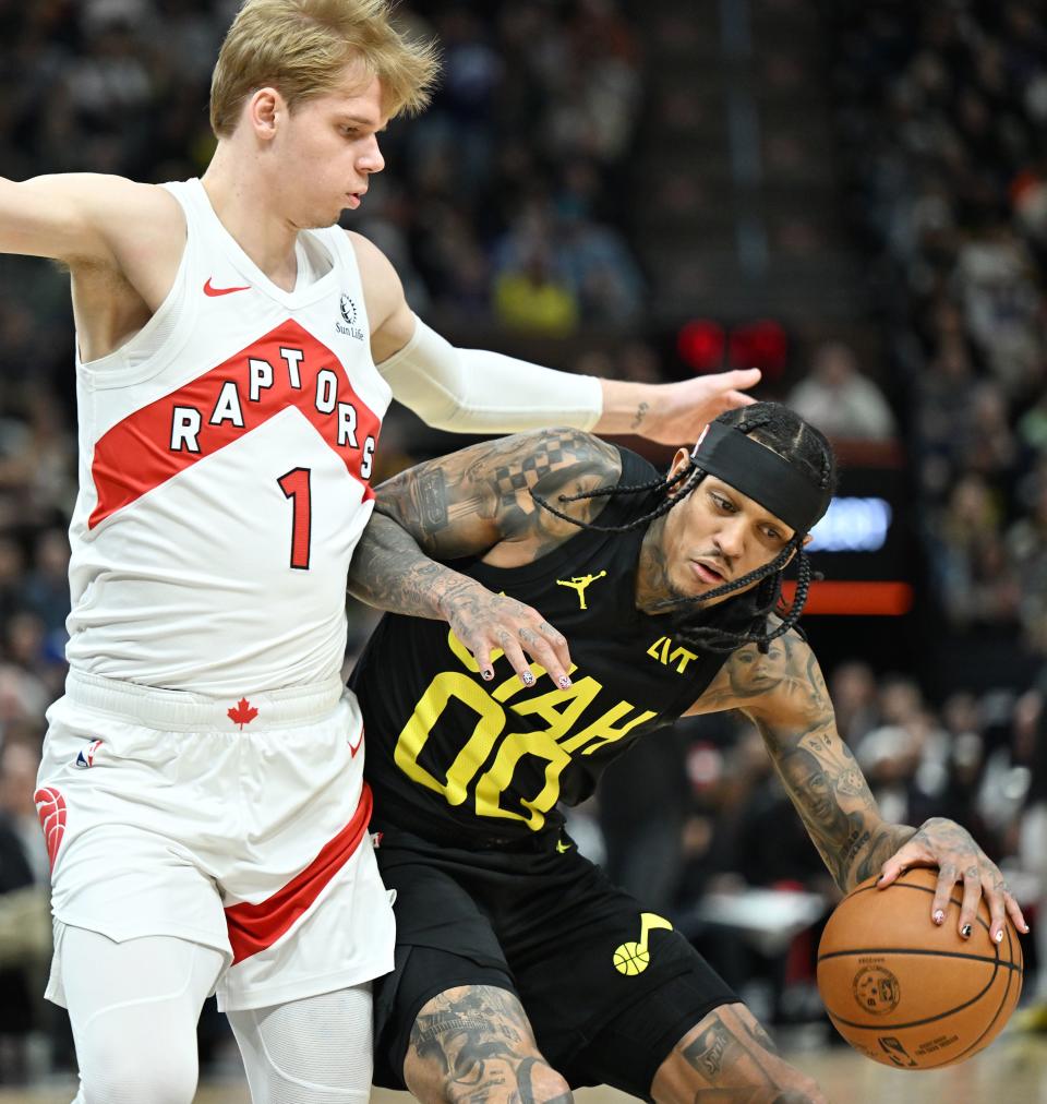 Utah Jazz guard Jordan Clarkson (00) is guarded by Toronto Raptors guard <a class="link " href="https://sports.yahoo.com/nba/players/10101" data-i13n="sec:content-canvas;subsec:anchor_text;elm:context_link" data-ylk="slk:Gradey Dick;sec:content-canvas;subsec:anchor_text;elm:context_link;itc:0">Gradey Dick</a> (1) as the Jazz and Raptors play at the Delta Center in Salt Lake City on Friday, Jan. 12, 2024. Utah won 145-113. | Scott G Winterton, Deseret News