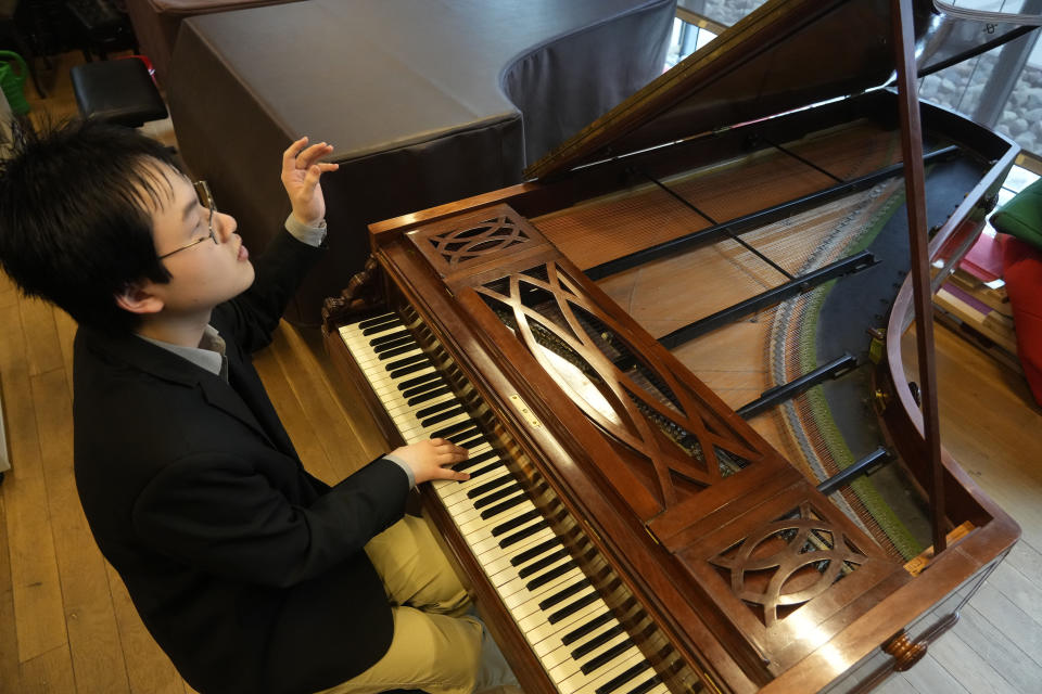 Canadian pianist Eric Guo plays music by Frederic Chopin on the last piano owned by the Romantic-era composer, an 1848 Pleyel, during an interview with The Associated Press at the Fryderyk Chopin Institute, in Warsaw, Poland, Saturday, March 2, 2024. Guo won a quintannual competition to play Chopin on period instruments organized by the Institute. (AP Photo/Czarek Sokolowski)