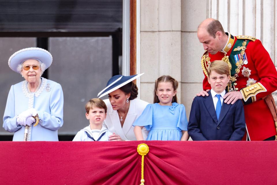 Queen Elizabeth II, Prince Louis of Cambridge, Catherine, Duchess of Cambridge, Princess Charlotte of Cambridge, Prince George of Cambridge and Prince William, Duke of Cambridge watch the RAF flypast on the balcony of Buckingham Palace during the Trooping the Colour parade