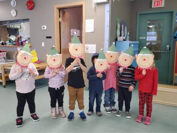 Christmas time for children at the Watson Lake Daycare. The town's only daycare is the subject of a COVID-19 public exposure notice. Although the daycare remains open, the town's mayor says many parents are staying home with their children this week. (Watson Lake Daycare - image credit)