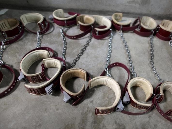 In this photo, reviewed by the U.S. Military, leg shackles are seen on the floor at Camp 6 detention center, at the U.S. Naval Base, in Guantanamo Bay, Cuba, January 21, 2009.  REUTERS/Brennan Linsley/Pool  