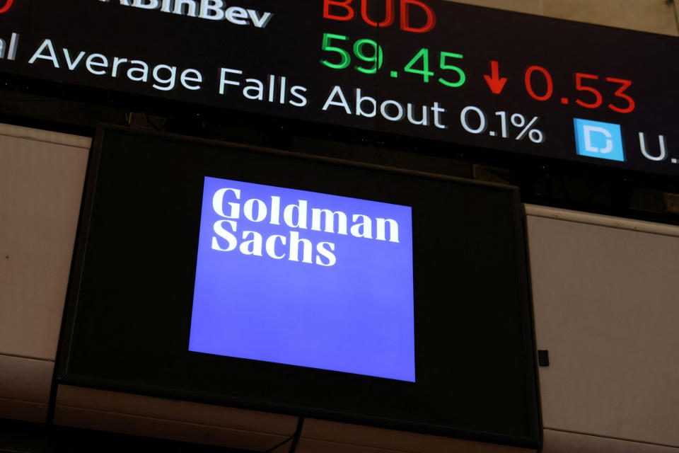 FILE PHOTO: The Goldman Sachs logo is seen on the trading floor of the New York Stock Exchange (NYSE) on November 17, 2021 in New York City, New York, United States.  REUTERS/Andrew Kelly/File photo