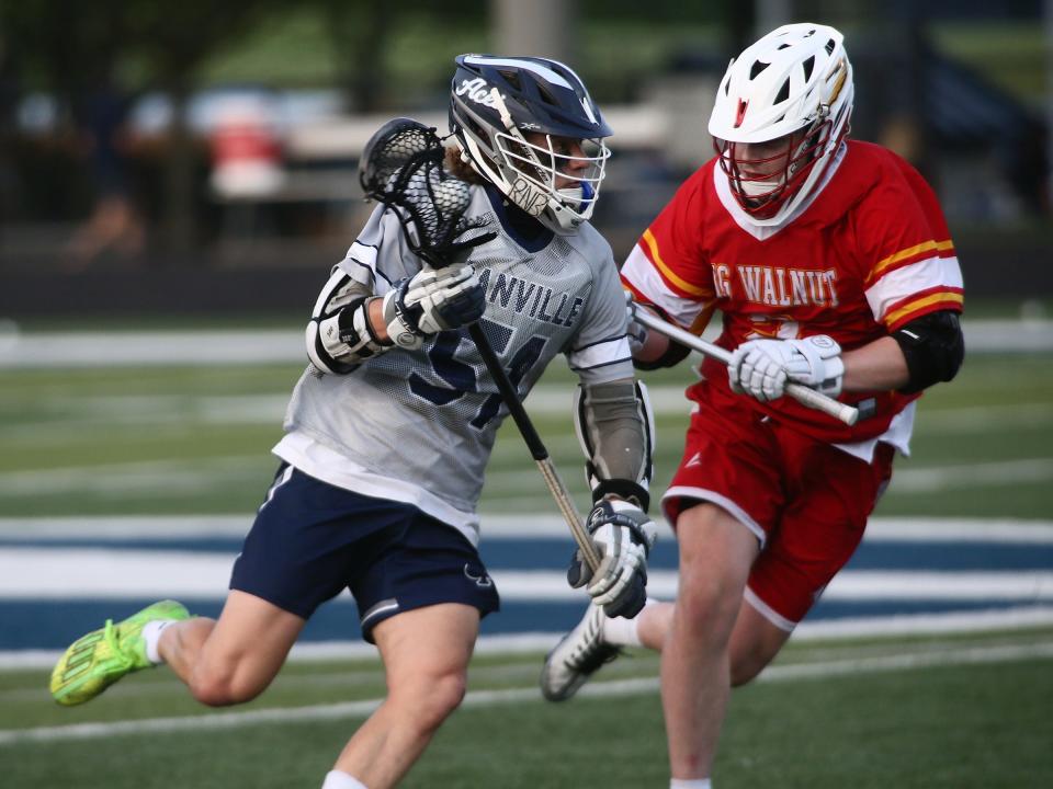 Granville's Noble Terebuh carries the ball against Big Walnut on Thursday.