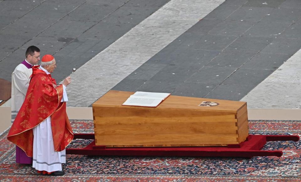 Cardinal Giovanni Battista Re blesses The coffin of Pope Emeritus Benedict XVI during his funeral mass at St. Peter's square in the Vatican (AFP via Getty Images)