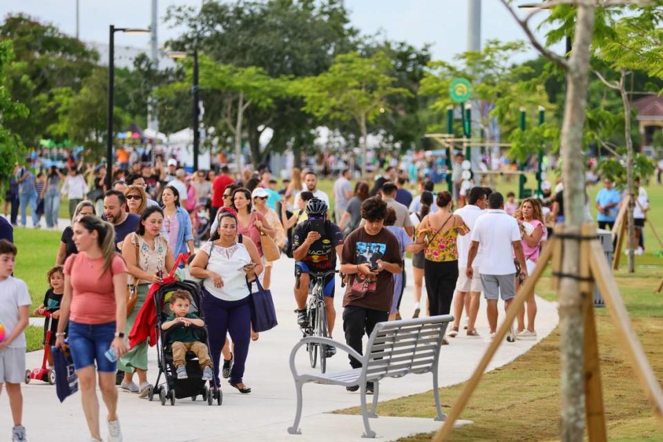 People attend the grand opening of the newly inaugurated eastern portion of Doral Central Park at 3005 NW 92nd Ave. in Doral, Florida, on Monday, Aug. 26, 2024.