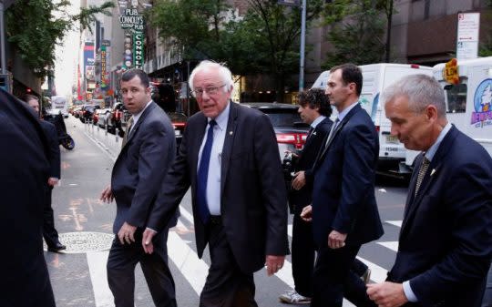 Bernie Sanders crosses a Manhattan street. (Photo: Lucas Jackson/Reuters)