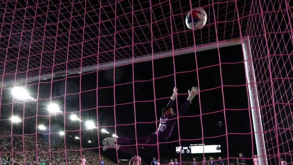 Inter Miami CF forward Lionel Messi (10) scores a goal past Cruz Azul goalkeeper Andres Gudiño (30) during the second half at DRV PNK Stadium on Friday.  - Nathan Ray Seebeck/USA Today/Reuters