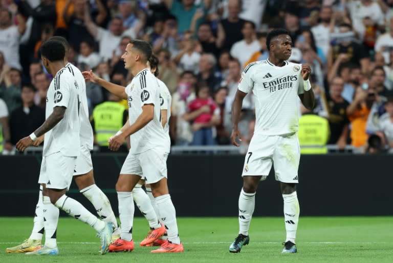 Vinicius Junior (R) celebrates his third goal for Real Madrid against Espanyol (Thomas COEX)