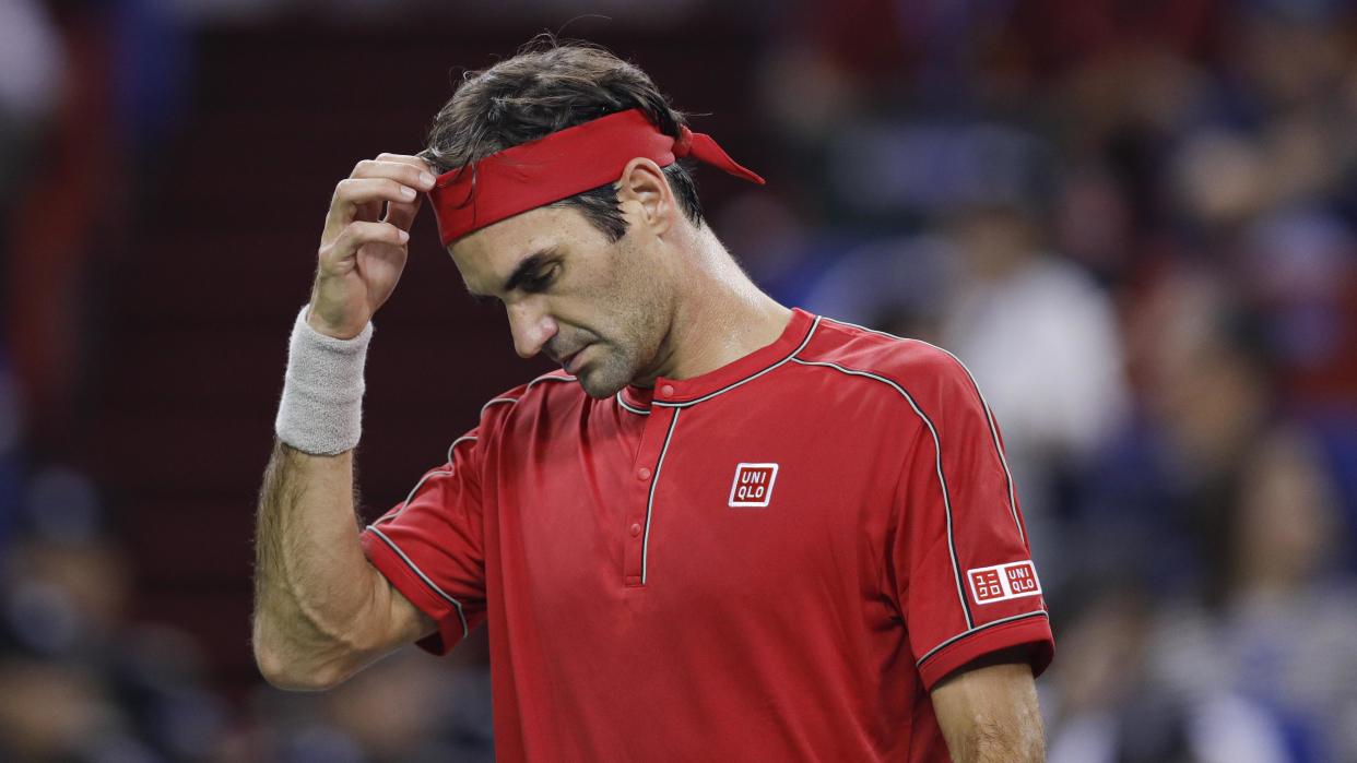 Roger Federer of Switzerland reacts against Alexander Zverev of Germany in Shanghai, China. (Fred Lee/Getty Images)