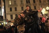 Revellers take part in New Year celebrations in Budapest January 1, 2014. REUTERS/Bernadett Szabo