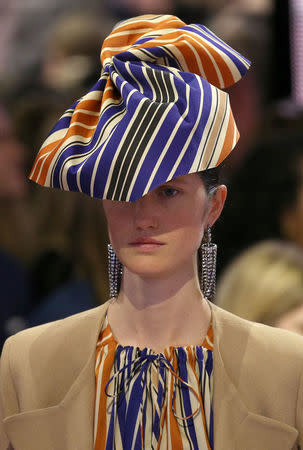 FILE PHOTO: A model displays a creation during the Mulberry show at London Fashion Week, in London, Britain February 16, 2018. REUTERS/Paul Hackett/File Photo