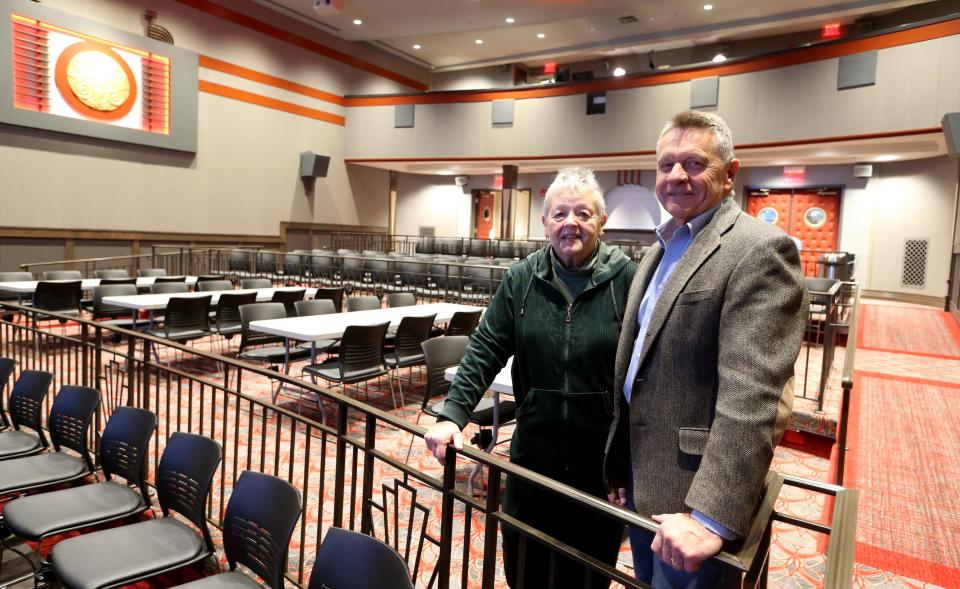 Donna Pontius and Randy Danielson, co-chairs of the committee that oversaw its renovation, stand on the main floor of The Rees in downtown Plymouth on Dec. 2, 2022.