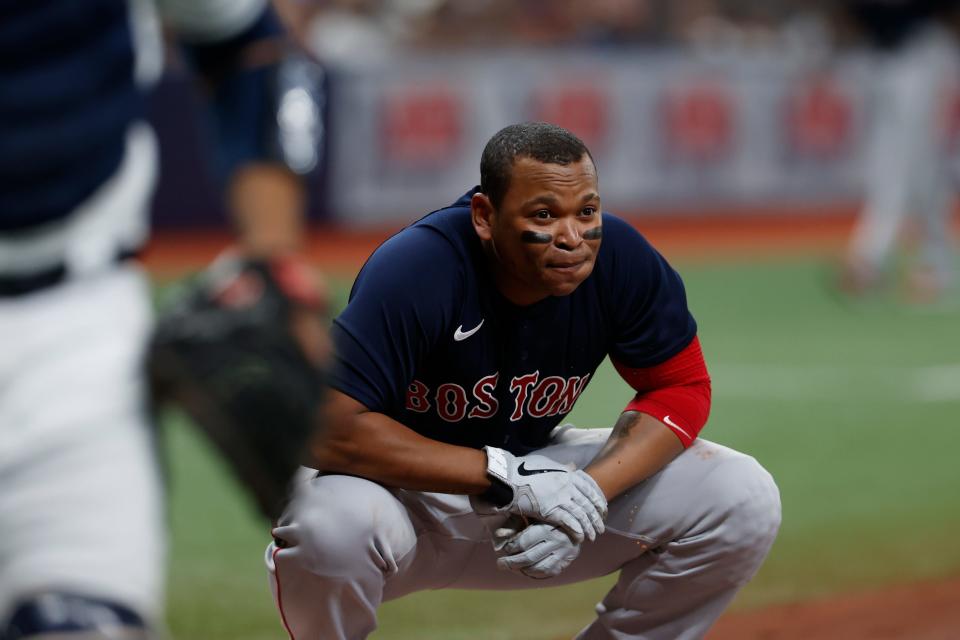 Red Sox third baseman Rafael Devers reacts after striking out against the Tampa Bay Rays last July in St. Petersburg, Fla. Devers could be a free agent after the 2023 season if he does not sign a contract extension before then.