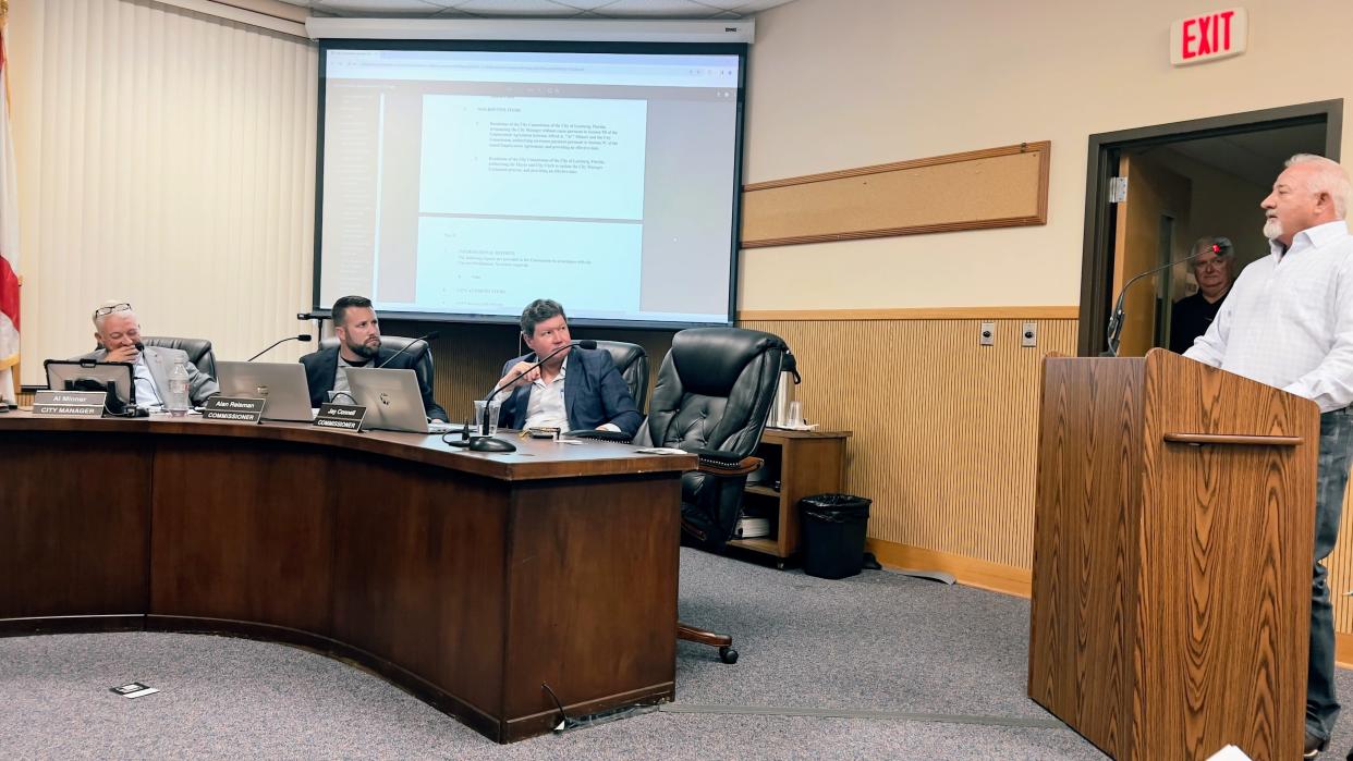 "To bring your personal feelings to a commission meeting is dead wrong,” former mayor Jay Hurley told the Leesburg commission at a May 13 meeting, showing support for City Manager Al Minner, left, as commissioners Alan Reisman and Jay Connell react with visible dismay.