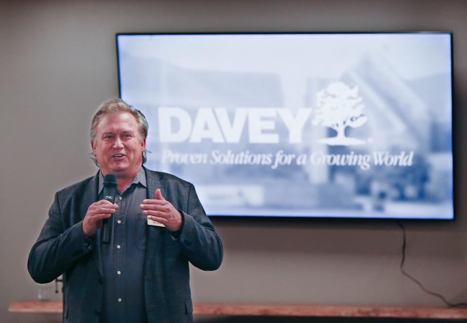 Davey Chairman, President and CEO Pat Covey speaks during an open house and tour Friday at the renovated headquarters in Kent.