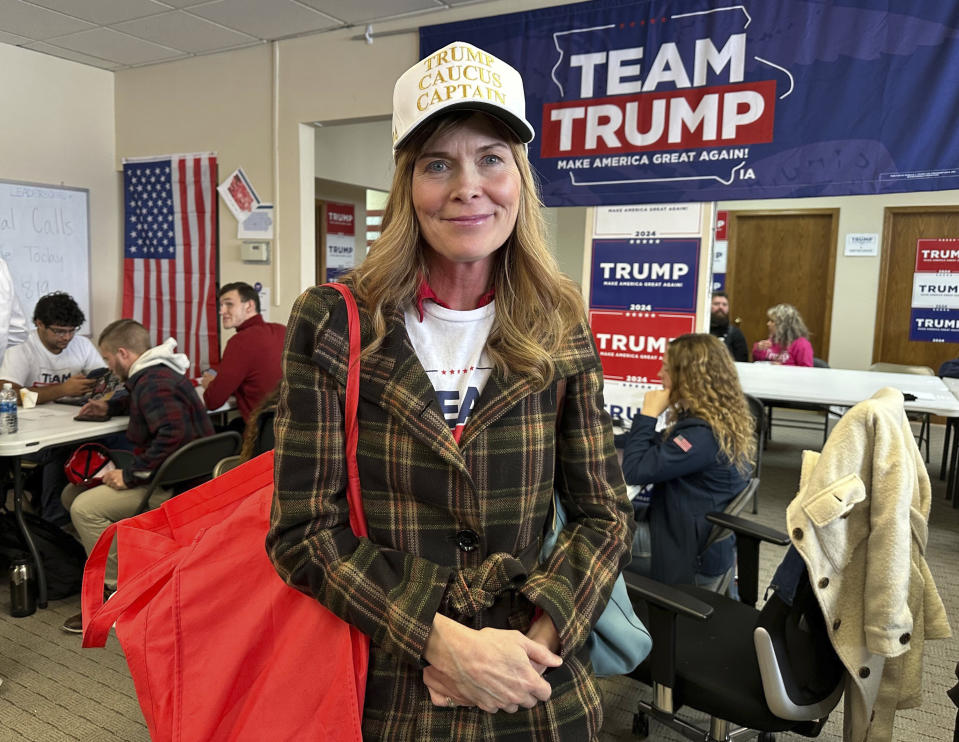 Melissa Davis, a volunteer and caucus captain, wears a special-edition hat at former president Donald Trump's campaign headquarters in the closing days ahead of the GOP Iowa caucus on Saturday, Jan. 13, 2024, in Urbandale, Iowa. (AP Photo/Jill Colvin)