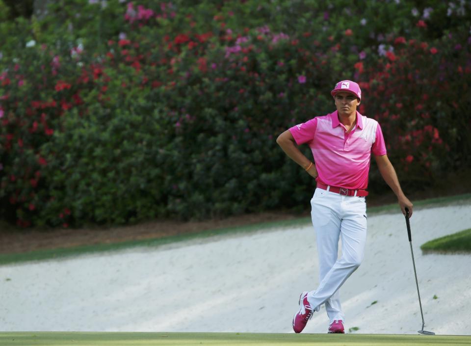 U.S. golfer Rickie Fowler waits to putt on the 13th green during the second round of the Masters golf tournament at the Augusta National Golf Club in Augusta, Georgia April 11, 2014. REUTERS/Mike Blake (UNITED STATES - Tags: SPORT GOLF)