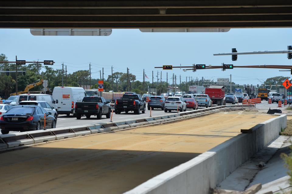 Two new traffic lanes on Clark Road, beneath the Interstate 75 overpass, when they were ready for asphalt in May 2023. The lanes will become the northbound on-ramp for the new diverging diamond interchange which is set to open June 2.