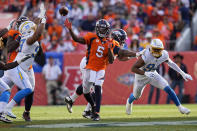 Denver Broncos quarterback Teddy Bridgewater (5) throws against the Los Angeles Chargers during the first half of an NFL football game, Sunday, Nov. 28, 2021, in Denver. (AP Photo/Jack Dempsey)