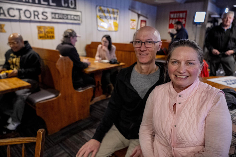 Cheryl and Dan Heffernen from Altoona, Iowa, pose for a photograph after listening to Donald Trump, Jr. speak at the Machine Shed in Urbandale, Iowa, Thursday, Jan. 11, 2024. (AP Photo/Andrew Harnik)