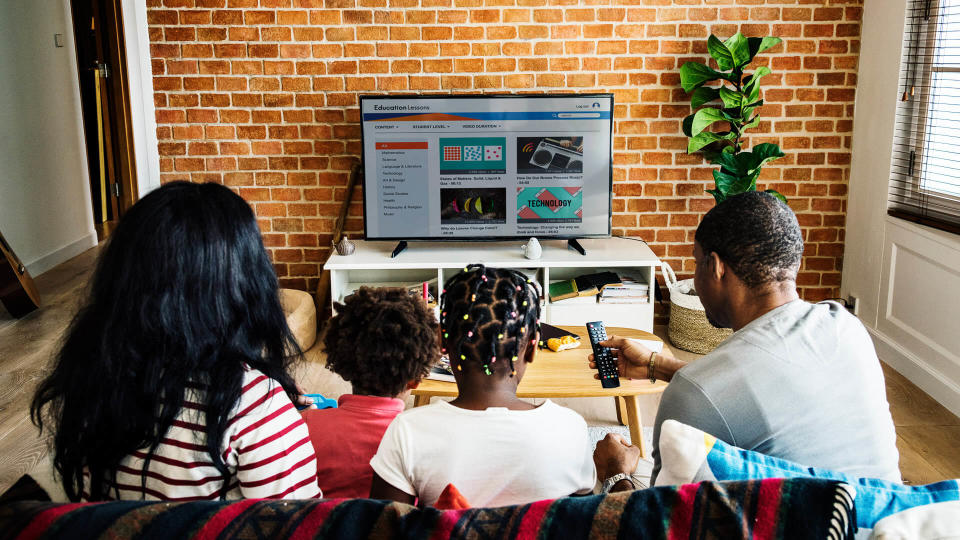 family watching on new television