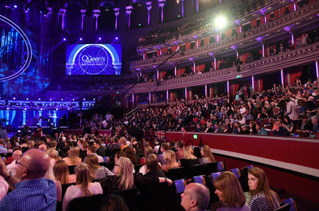 People gather for a special concert "The Queen's Birthday Party" to celebrate the 92nd birthday of Britain's Queen Elizabeth at the Royal Albert Hall in London, Britain April 21, 2018. Andrew Parsons/Pool via Reuters