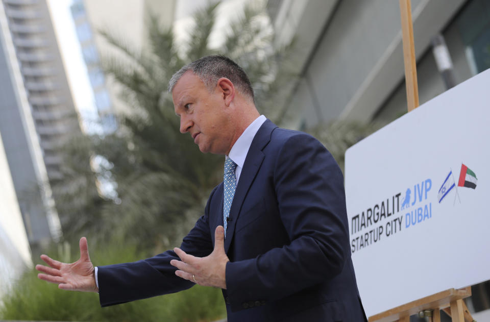 Erel Margalit, founder and chairman of Jerusalem Venture Partners, JVP, talks to The Associated Press in Dubai, United Arab Emirates, Tuesday, Oct. 27, 2020. Another plane full of Israeli business people excited about their newfound access to the UAE has touched down in Dubai this week. It's the latest whirlwind trip seeking to cash in on a U.S.-brokered deal to normalize relations between the countries. (AP Photo/Kamran Jebreili)