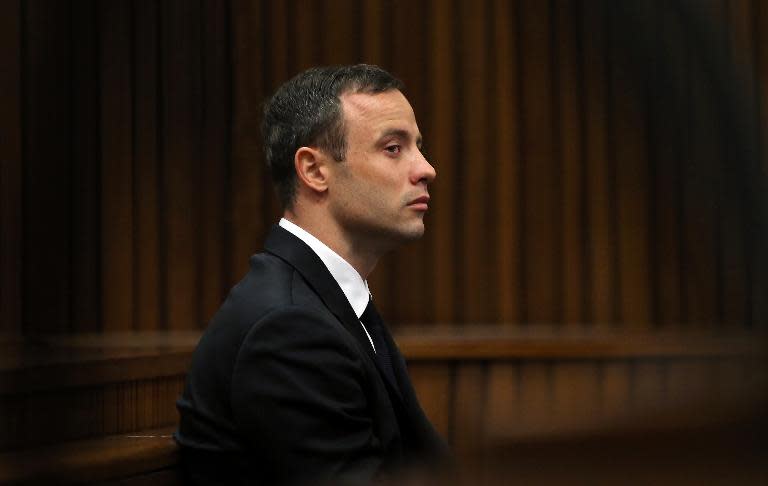 Oscar Pistorius attends his trial in court in Pretoria on April 7, 2014