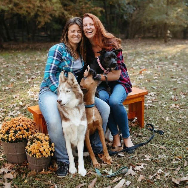 The author (right) and Kelsey with their three rescue dogs Bu, Romeo, and Ruthie, in Greenville, North Carolina. (Photo: Courtesy of Mady Noel Photo)