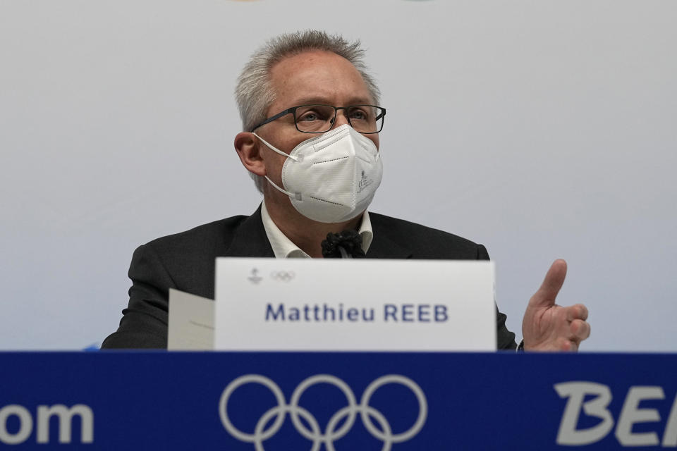 Court of Arbitration for Sport director general Matthieu Reeb speaks during a press comference at the 2022 Winter Olympics, Monday, Feb. 14, 2022, in Beijing. The Court ruled after a hastily arranged hearing that lasted into early Monday morning that the 15-year-old Kamila Valieva, the favorite for the women's individual gold, does not need to be provisionally suspended ahead of a full investigation. (AP Photo/Sue Ogrocki)