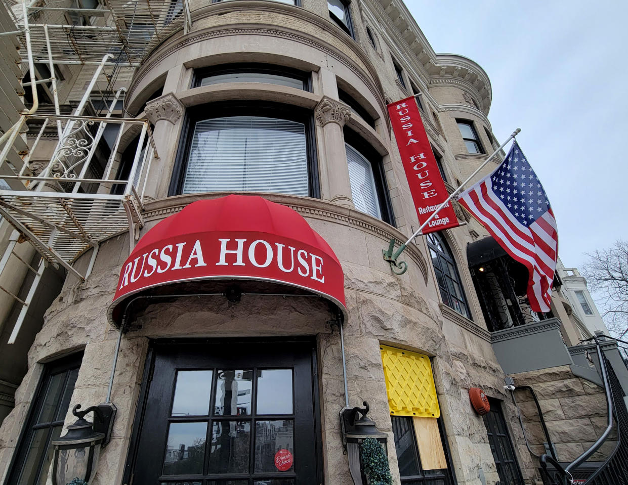 The Russia House bar and restaurant waves the American flag outside its entrance