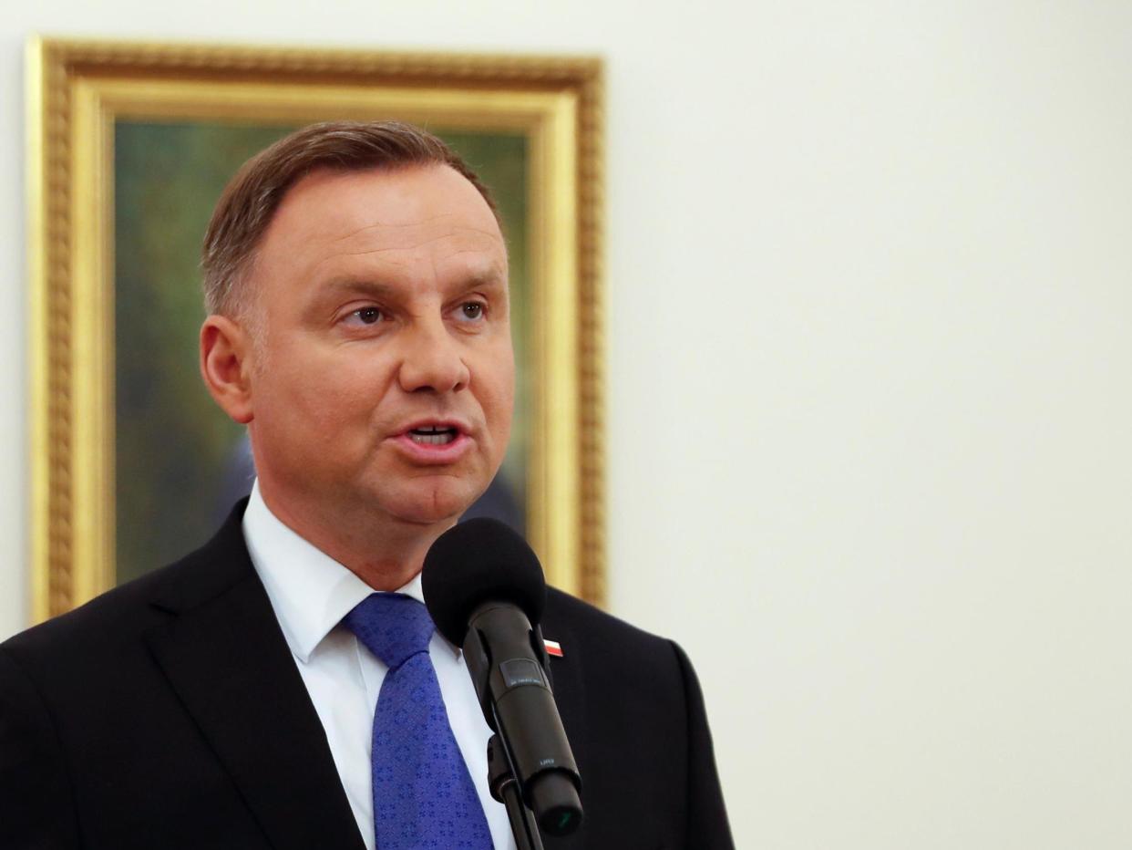 The incumbent president Andrzej Duda talks to the media in Warsaw, Poland, after the first exit polls were announced on 12 July, 2020: Reuters