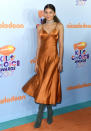 <p>The 20-year-old actress wore a $38 orange slip dress from her Daya by Zendaya line at the 2017 Kids’ Choice Awards. (Photo: Getty Images) </p>