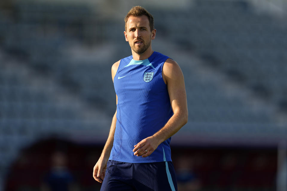 England's Harry Kane takes part in drills during a training session at Al Wakrah Sports Complex on the eve of the group B World Cup soccer match between England and Wales, in Al Wakarah, Qatar, Monday, Nov. 28, 2022. (AP Photo/Abbie Parr)