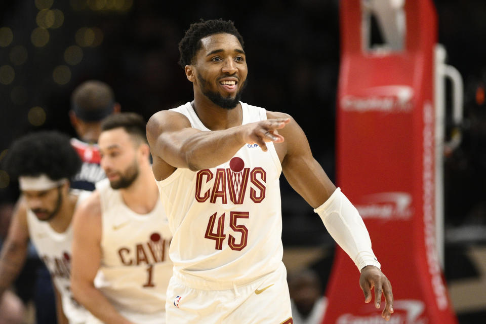 Cleveland Cavaliers guard Donovan Mitchell (45) gestures after he made a 3-point basket against the Washington Wizards during the first half of an NBA basketball game Wednesday, Feb 7, 2024, in Washington. (AP Photo/Nick Wass)